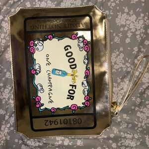 Betsey Johnson Gold Clutch with Graphic Design